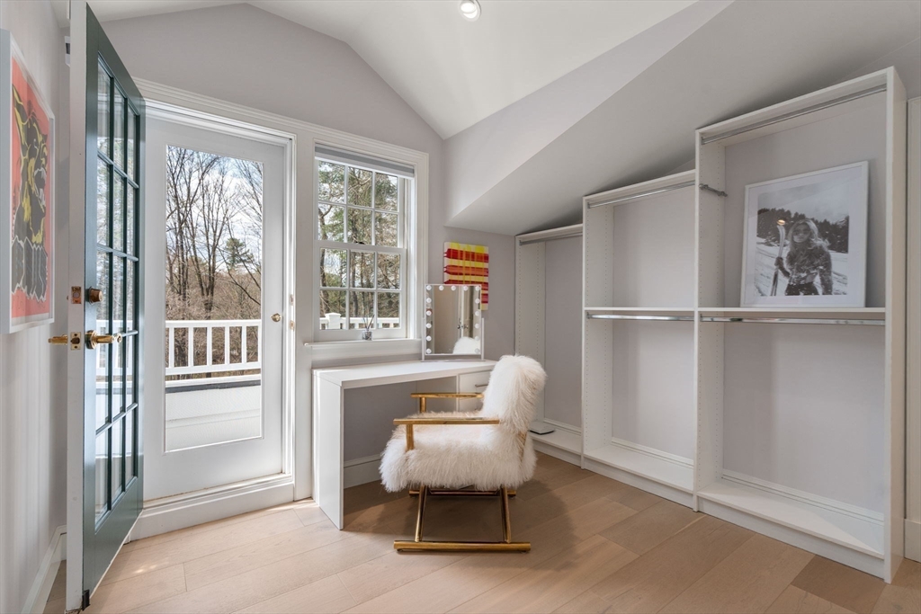 389 Grove Street Needham, MA 02492 - Photo 23 of 40 a living room with furniture and a window