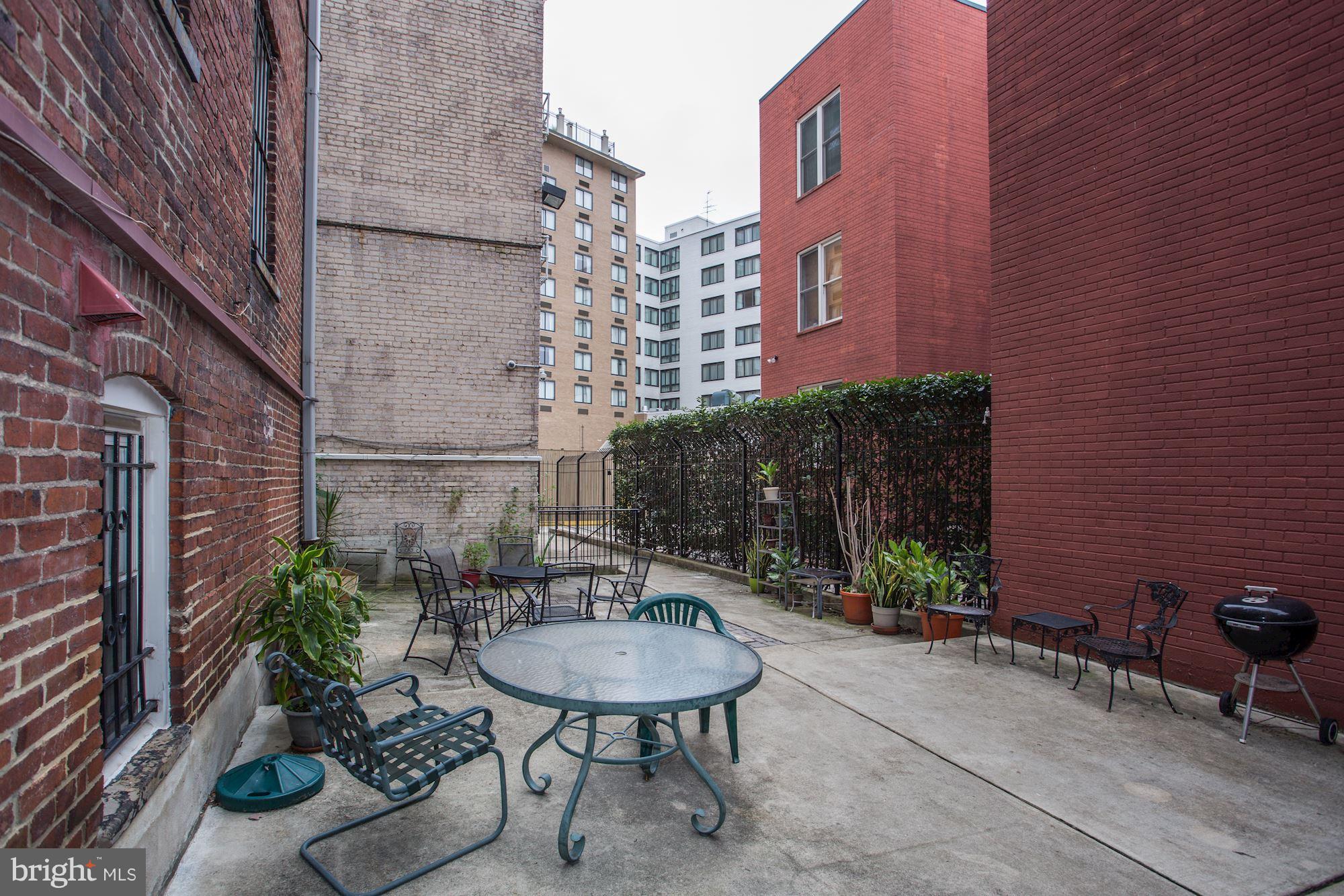 1322 15th Street Northwest, Unit 32 Washington, DC 20005 - Photo 14 of 20 common use courtyard and grilling area