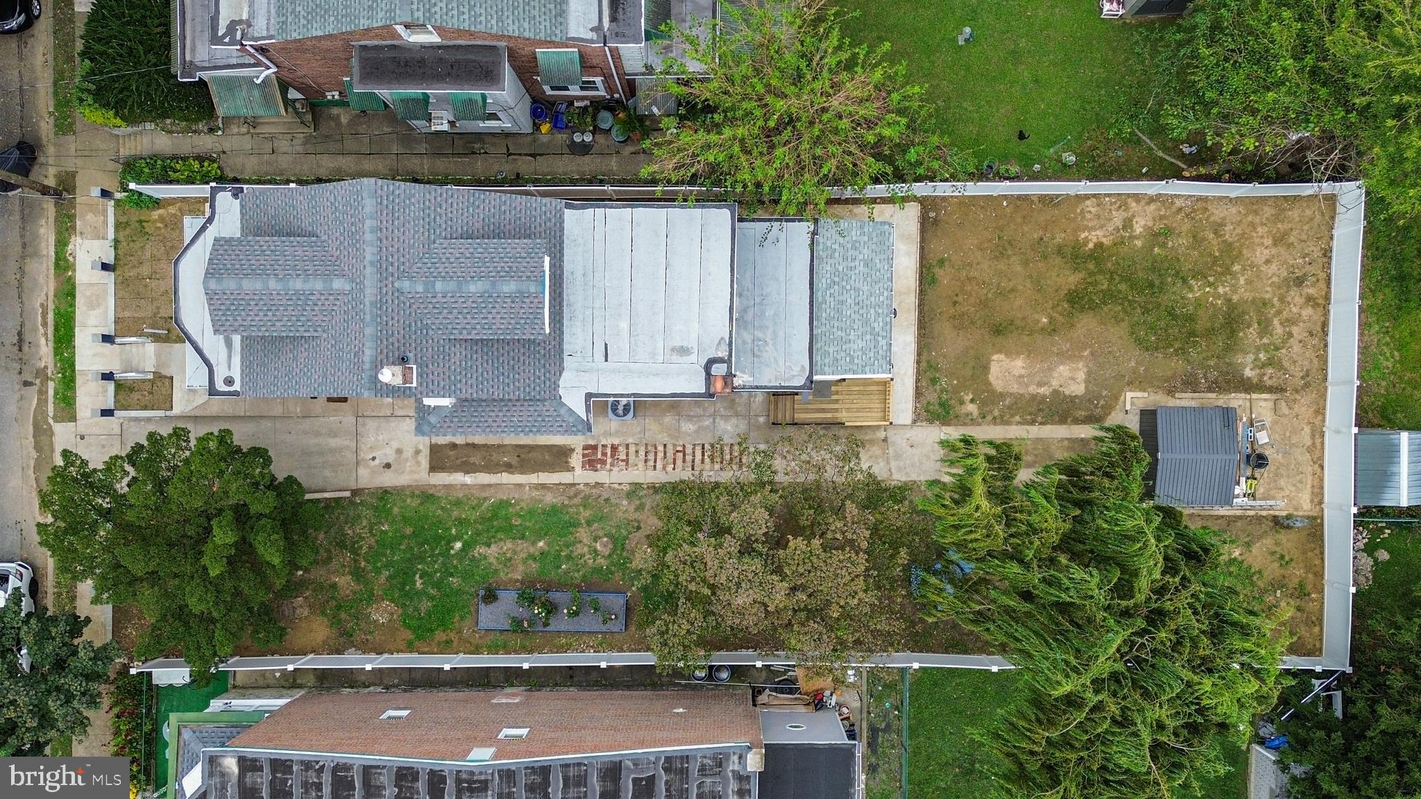 407 Sanger Street Philadelphia, PA 19120 - Photo 30 of 47 an aerial view of residential houses with outdoor space and trees