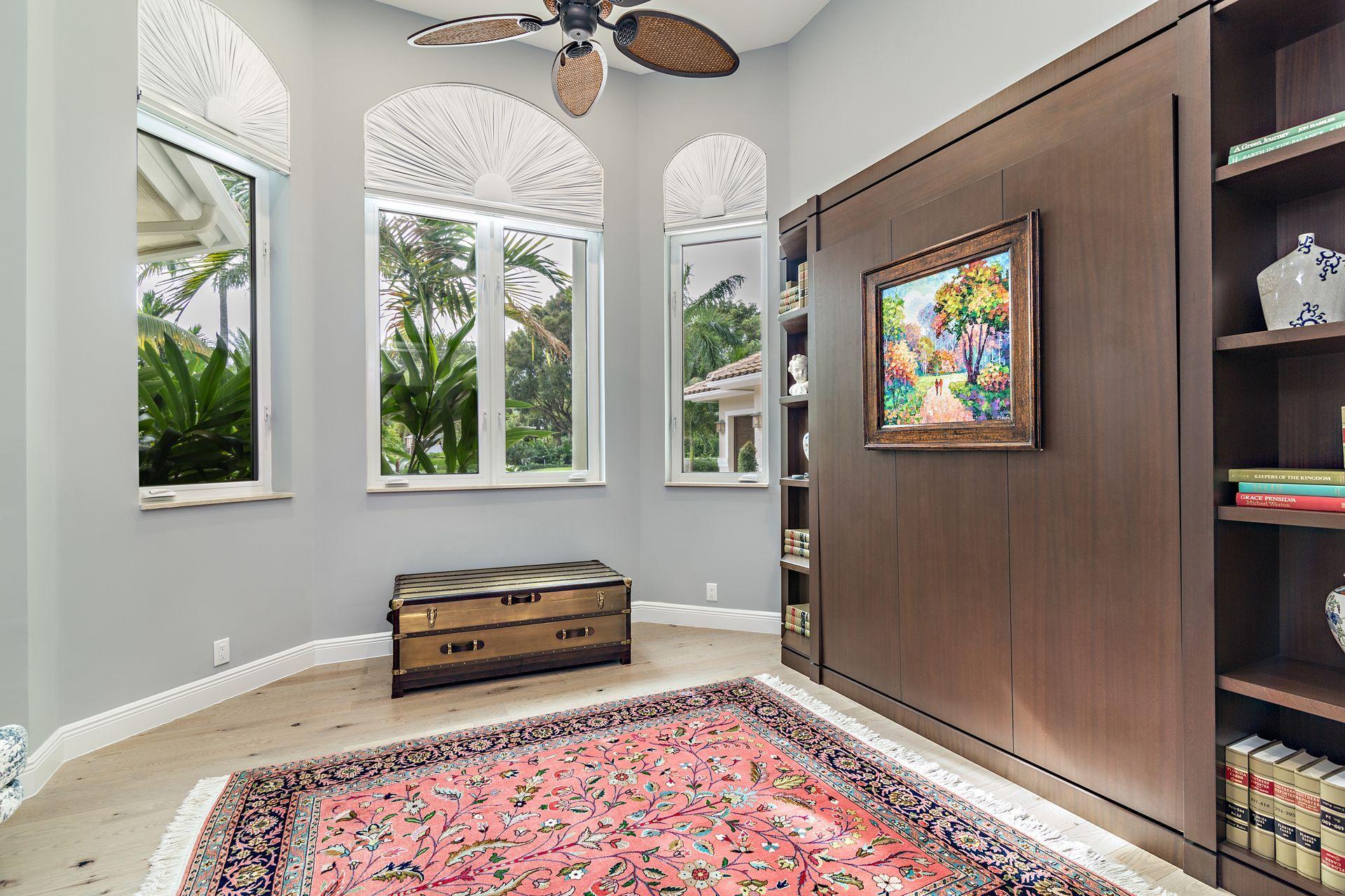 3376 Barrow Island Road Jupiter, FL 33477 - Photo 21 of 48 a bedroom with furniture and a window