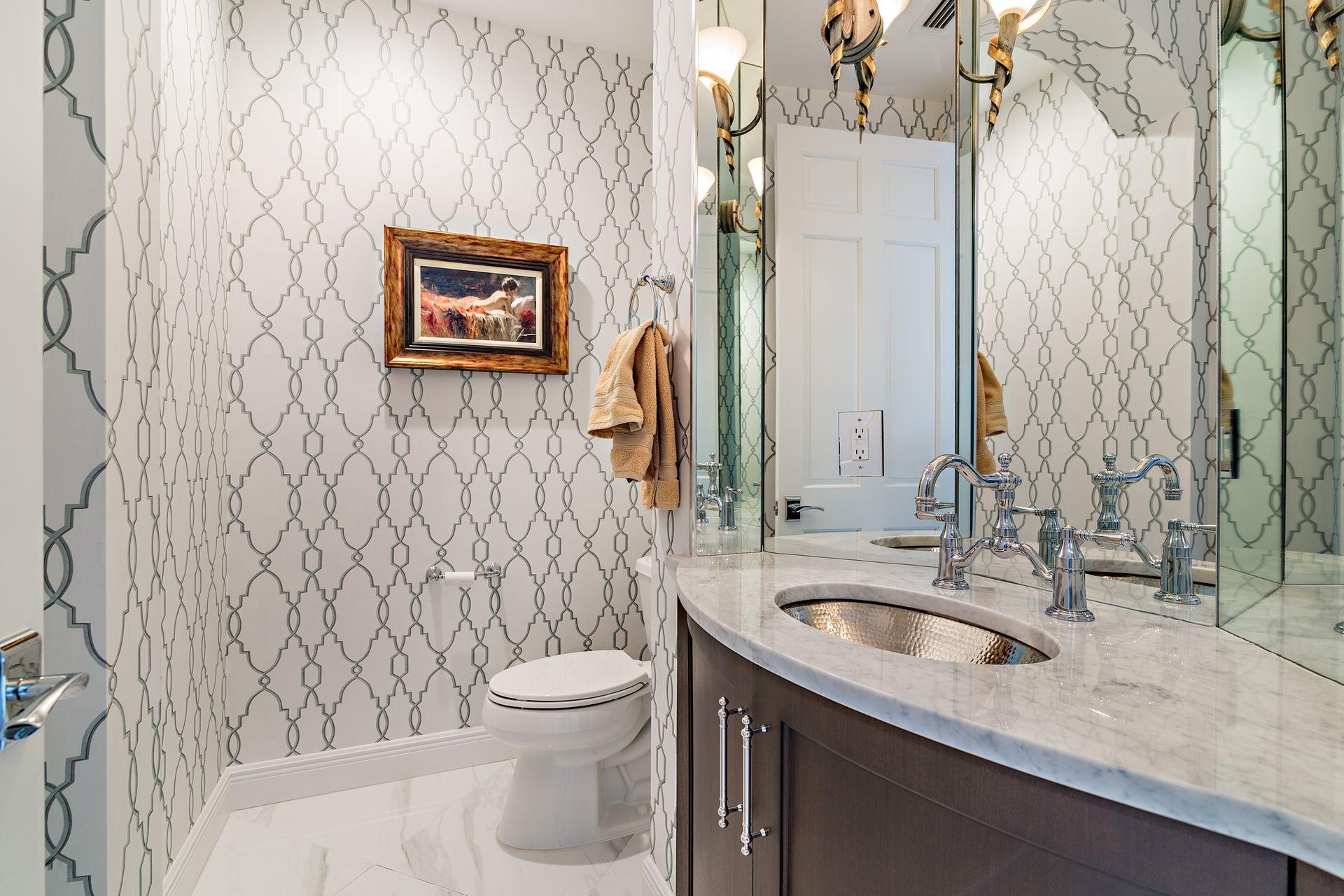 3376 Barrow Island Road Jupiter, FL 33477 - Photo 27 of 48 a bathroom with a granite countertop sink and a toilet