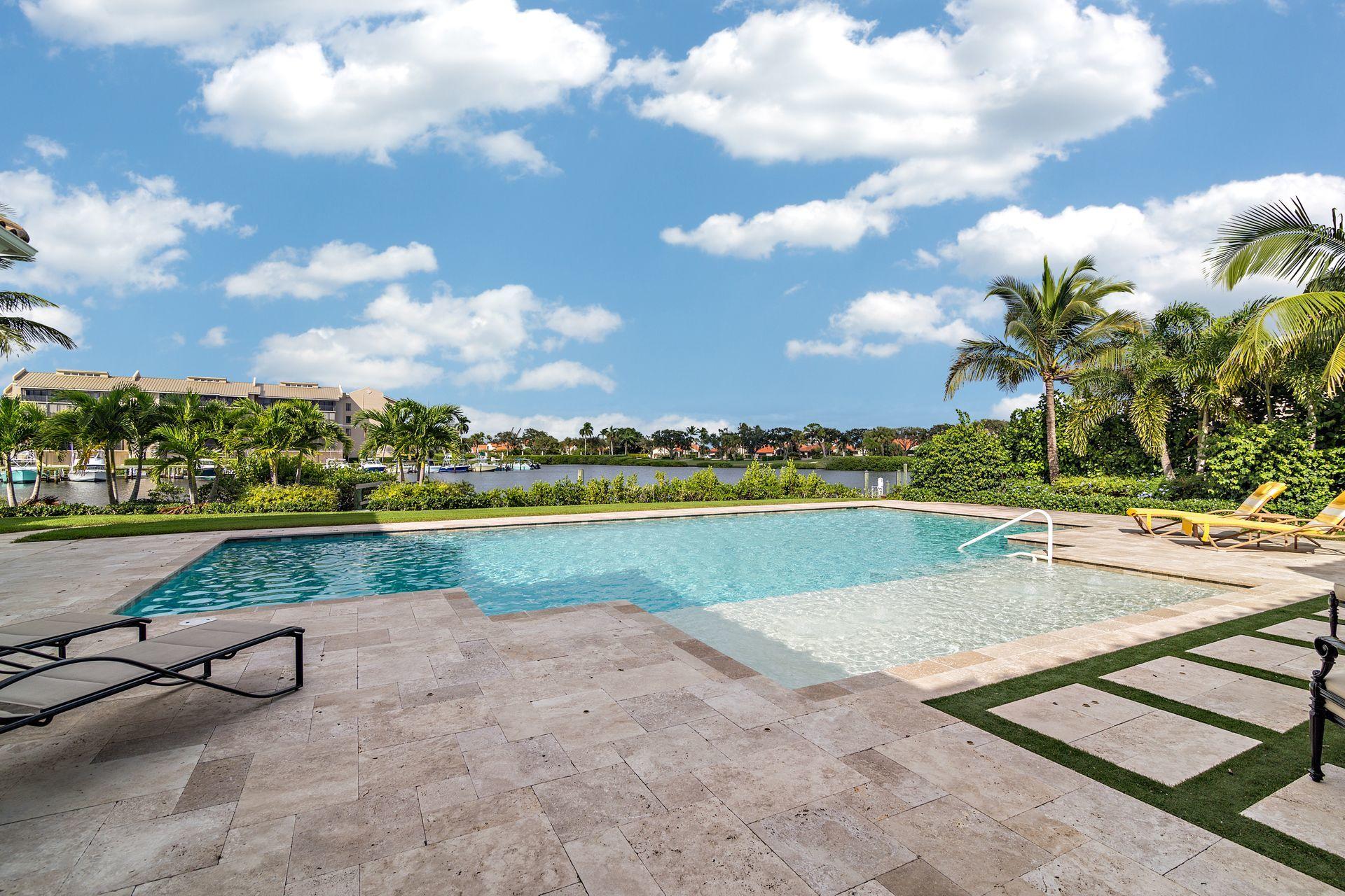 3376 Barrow Island Road Jupiter, FL 33477 - Photo 35 of 48 a view of swimming pool and lake view