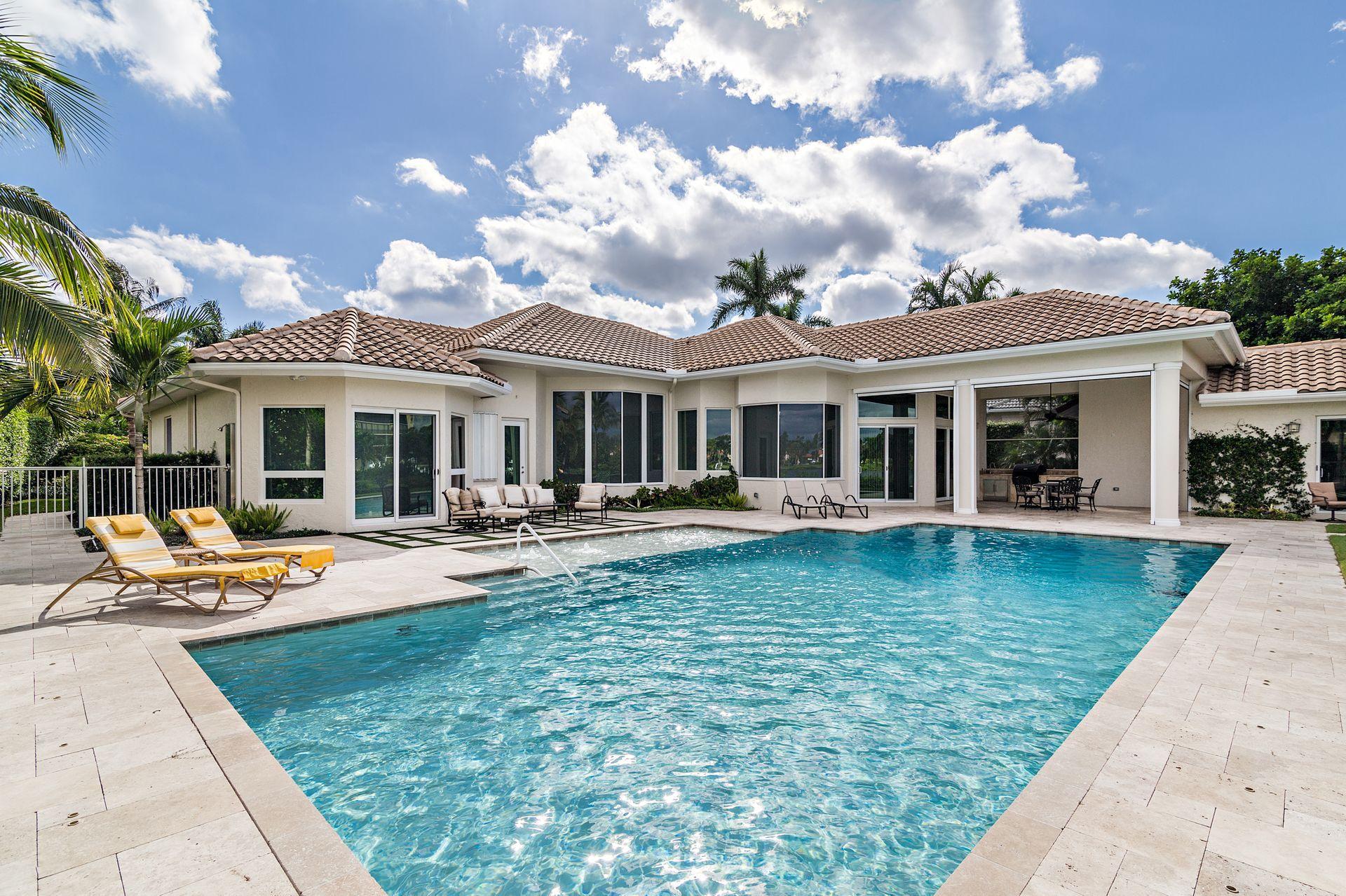3376 Barrow Island Road Jupiter, FL 33477 - Photo 37 of 48 a view of a house with swimming pool and sitting area