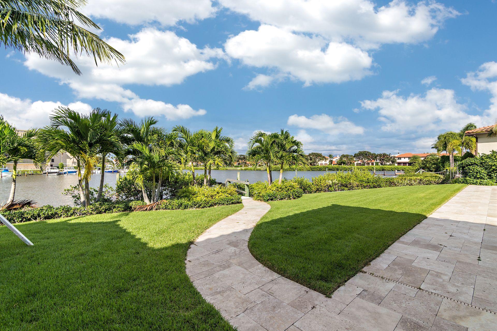 3376 Barrow Island Road Jupiter, FL 33477 - Photo 40 of 48 a view of a park with swings and slides