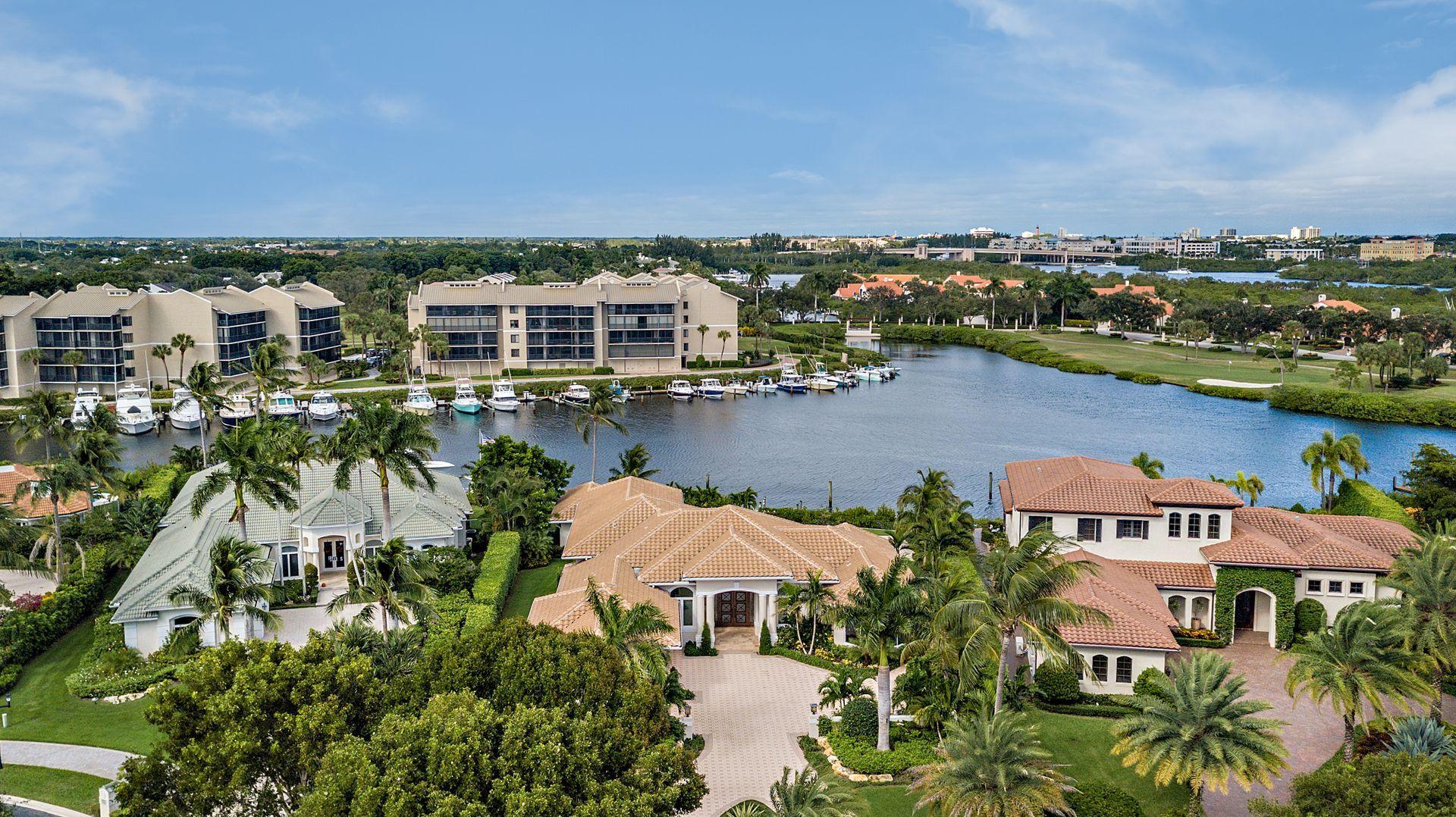 3376 Barrow Island Road Jupiter, FL 33477 - Photo 43 of 48 an aerial view of a house with a lake view