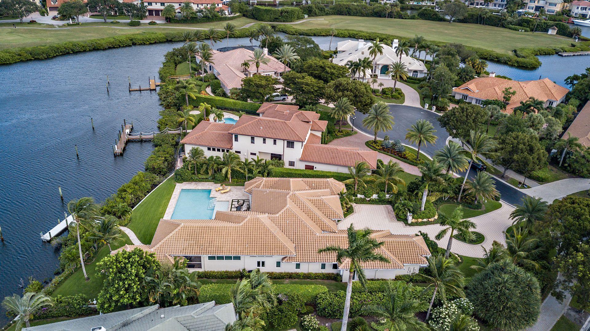 3376 Barrow Island Road Jupiter, FL 33477 - Photo 44 of 48 an aerial view of a house with outdoor space and lake view