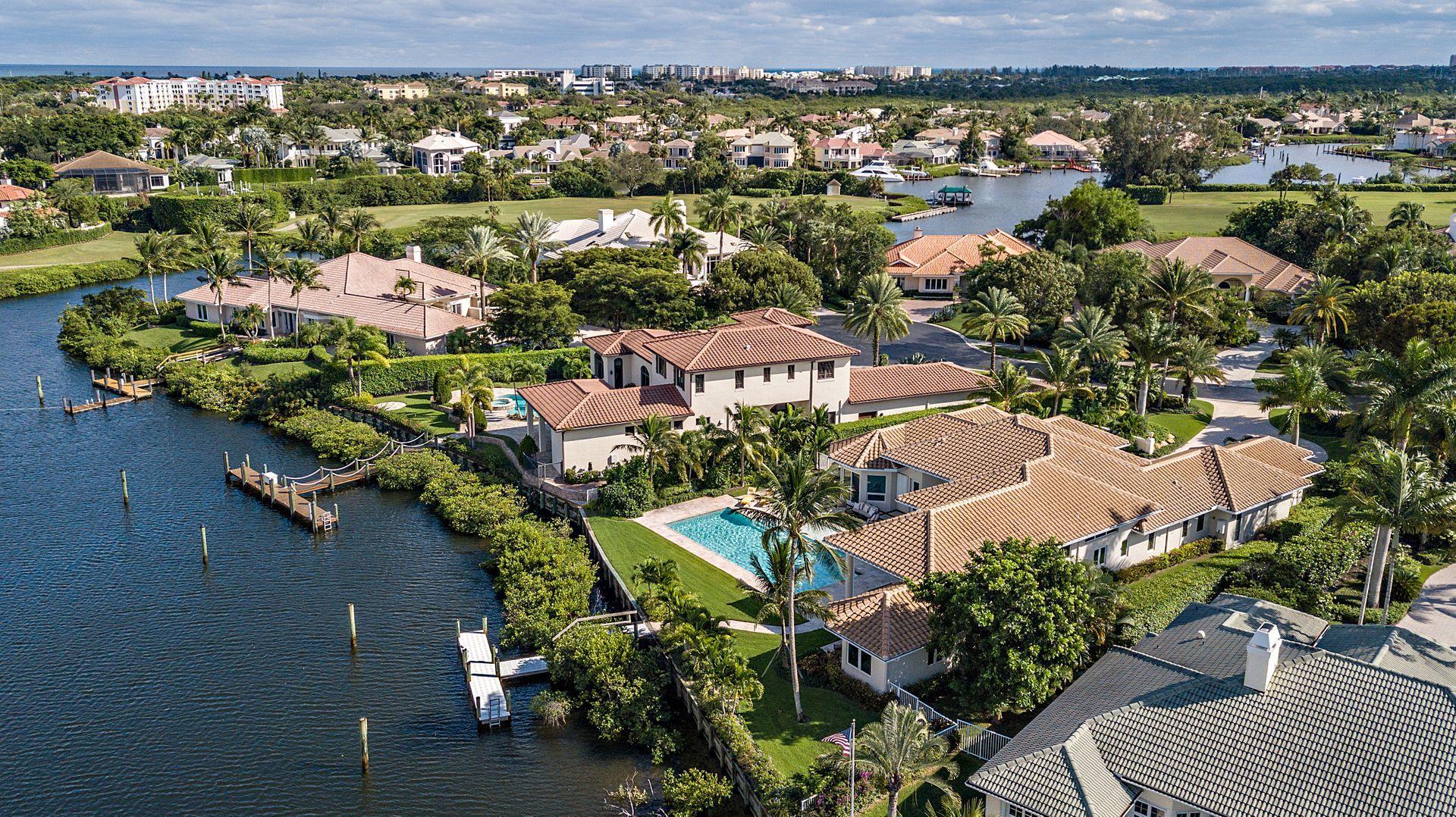 3376 Barrow Island Road Jupiter, FL 33477 - Photo 48 of 48 an aerial view of residential houses with outdoor space and swimming pool