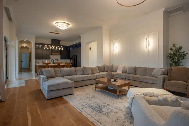 a large living room with a flat screen tv