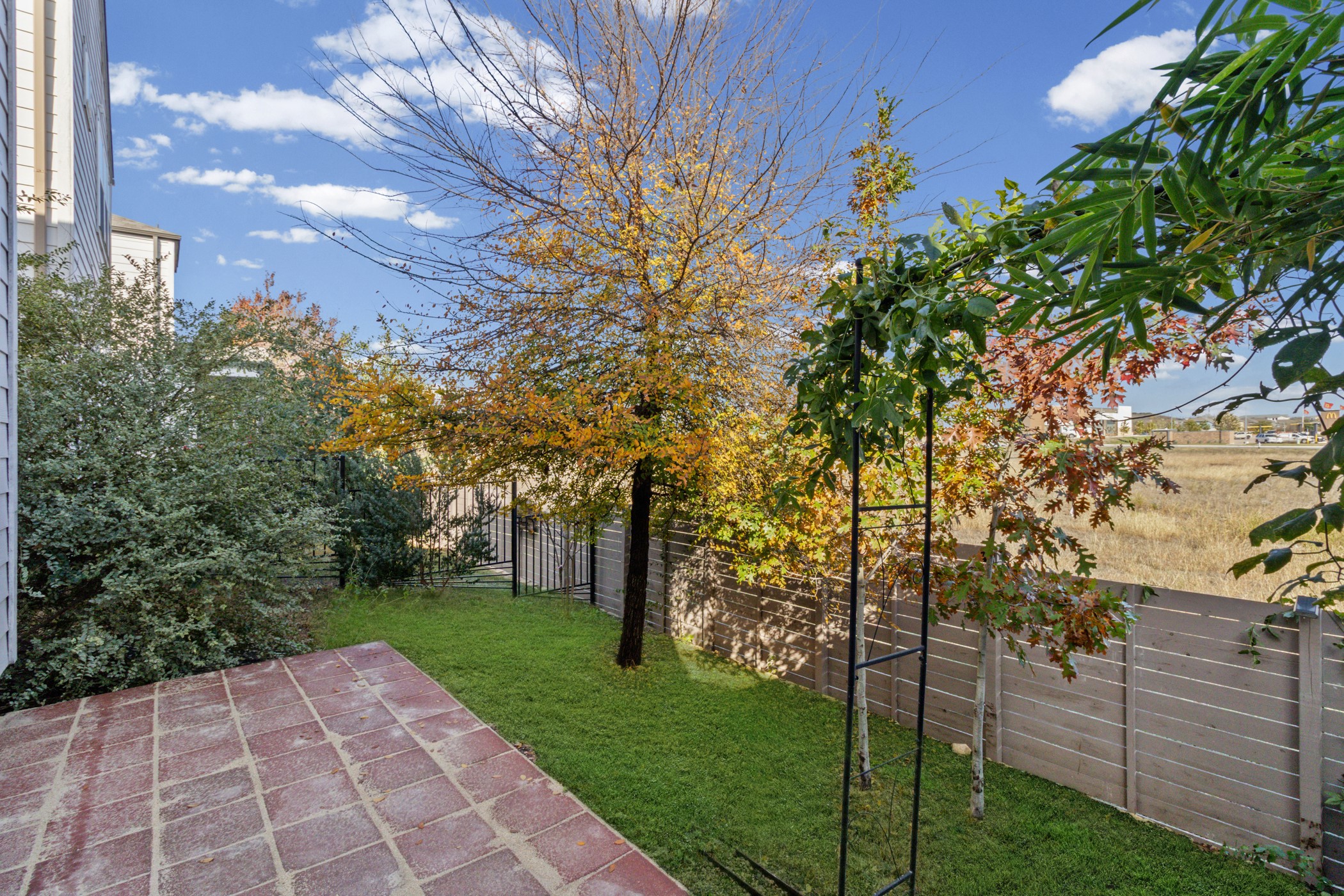 7116 Silver Star Lane, Unit 75 Austin, TX 78744 - Photo 23 of 35 View of fenced backyard