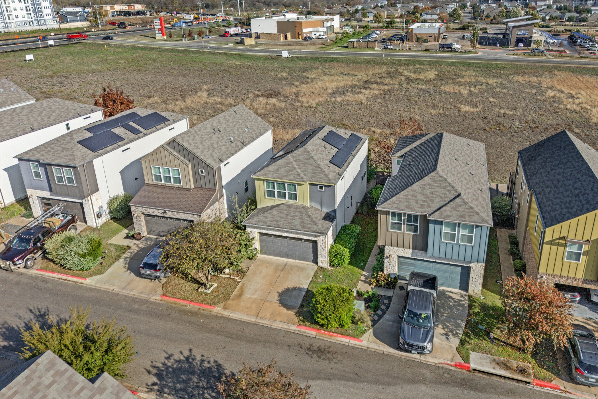 7116 Silver Star Lane, Unit 75 Austin, TX 78744 - Photo 24 of 35 Aerial perspective of suburban area