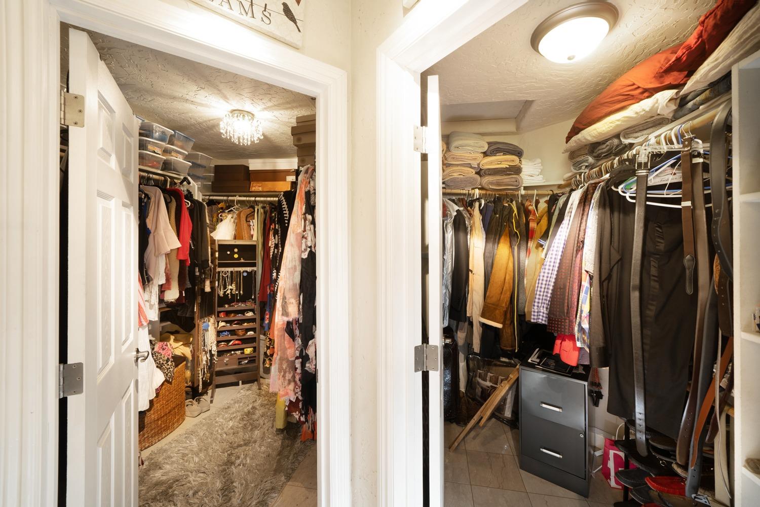 21197 Steward Road Madera, CA 93638 - Photo 23 of 41 a view of walk in closet with clothes and shoes
