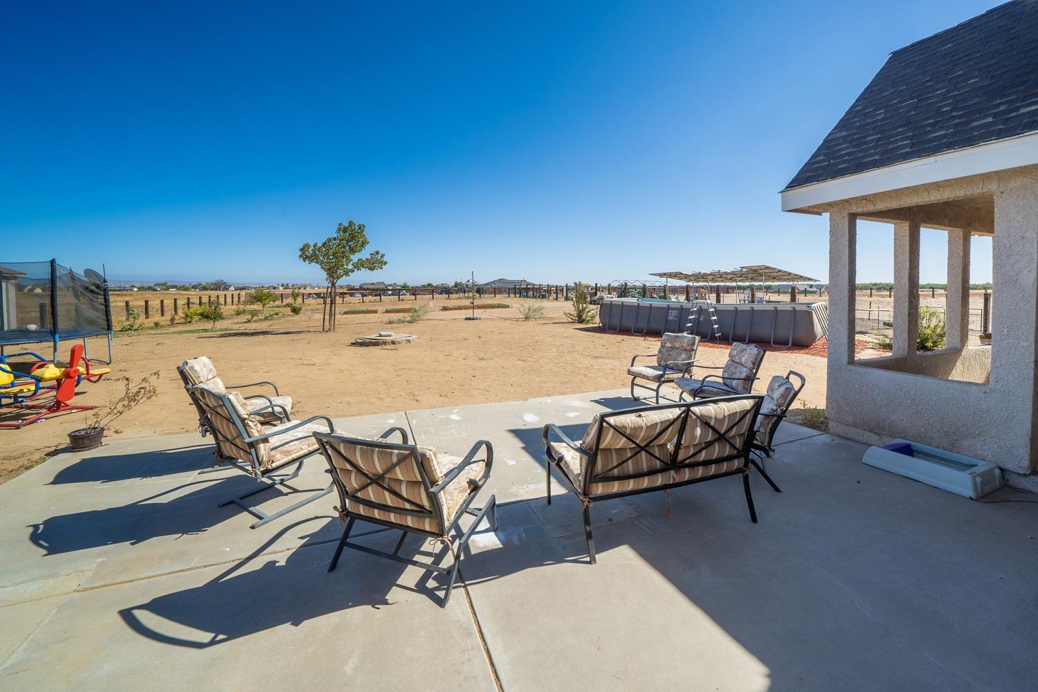 21197 Steward Road Madera, CA 93638 - Photo 37 of 41 a view of a terrace with furniture