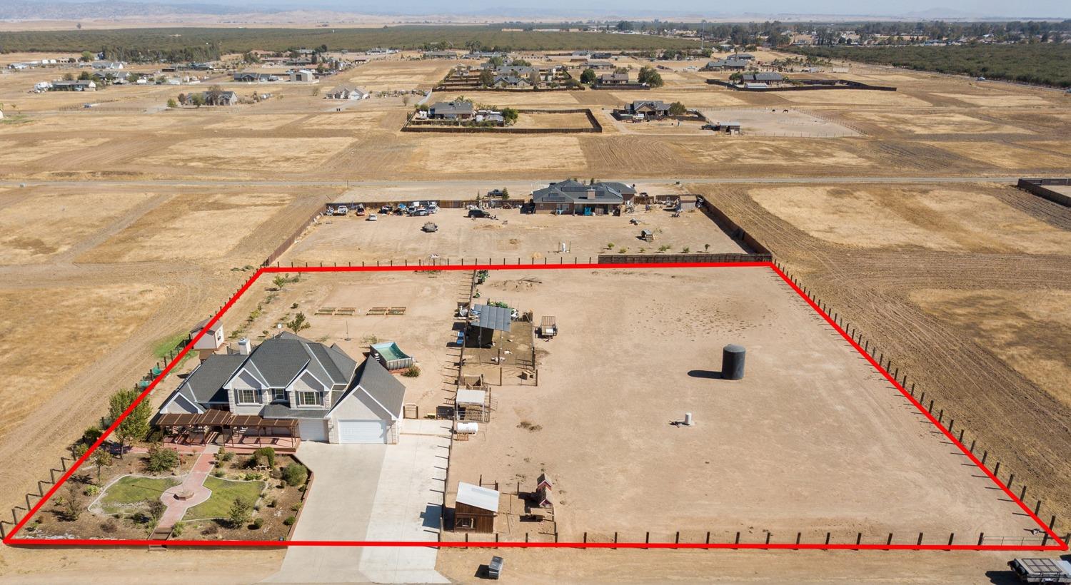 21197 Steward Road Madera, CA 93638 - Photo 8 of 41 an aerial view of residential houses with outdoor space