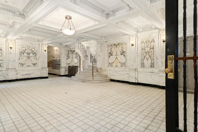 a view of a building with a window and hardwood floor