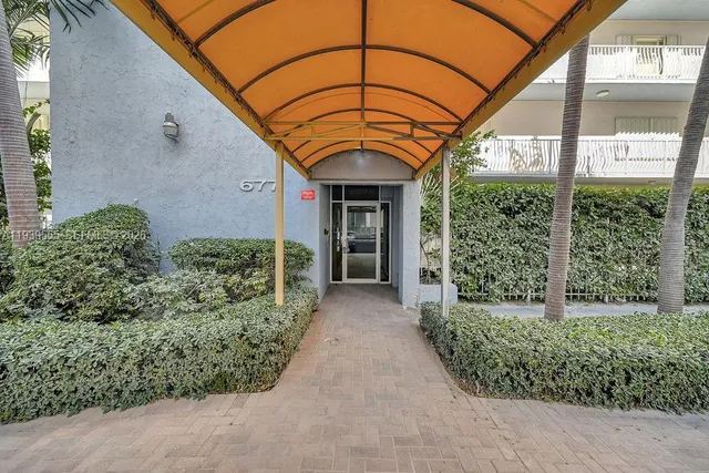 a view of a entrance gate of a house