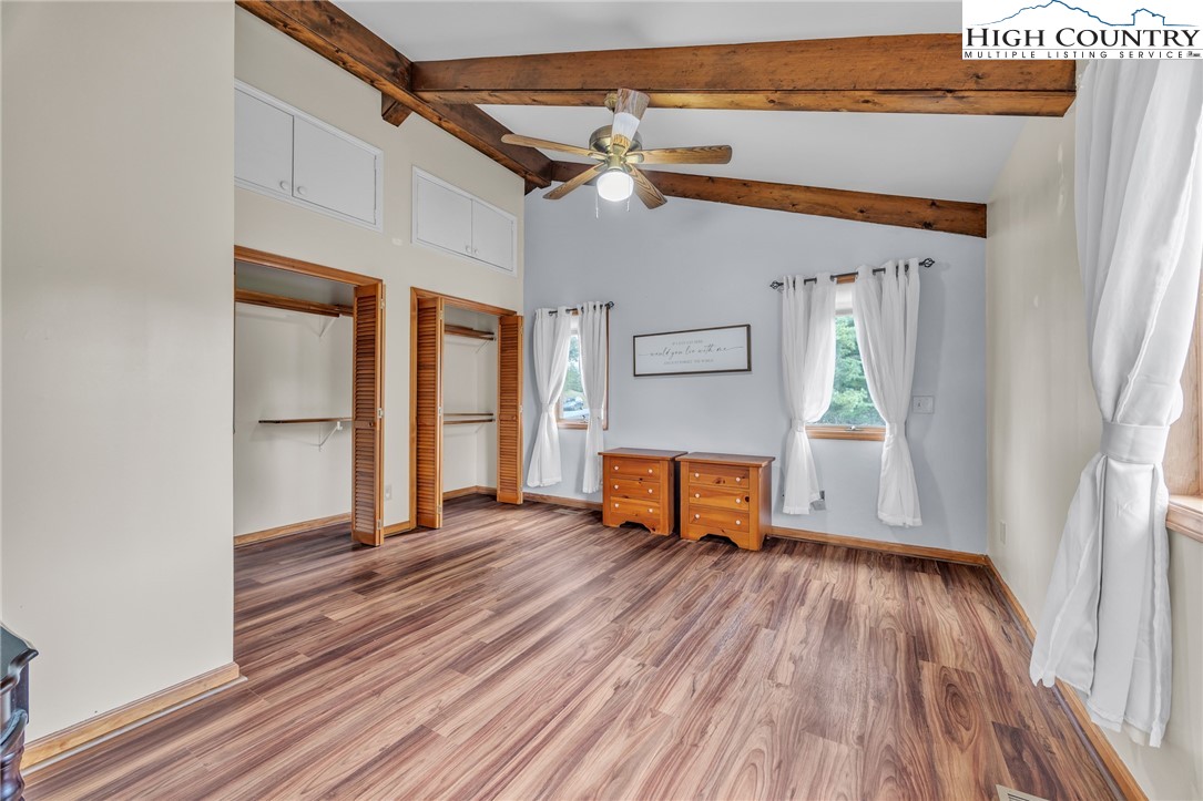 255 Clear View Ridge Crumpler, NC 28617 - Photo 14 of 42 a view of a livingroom with wooden floor and a window
