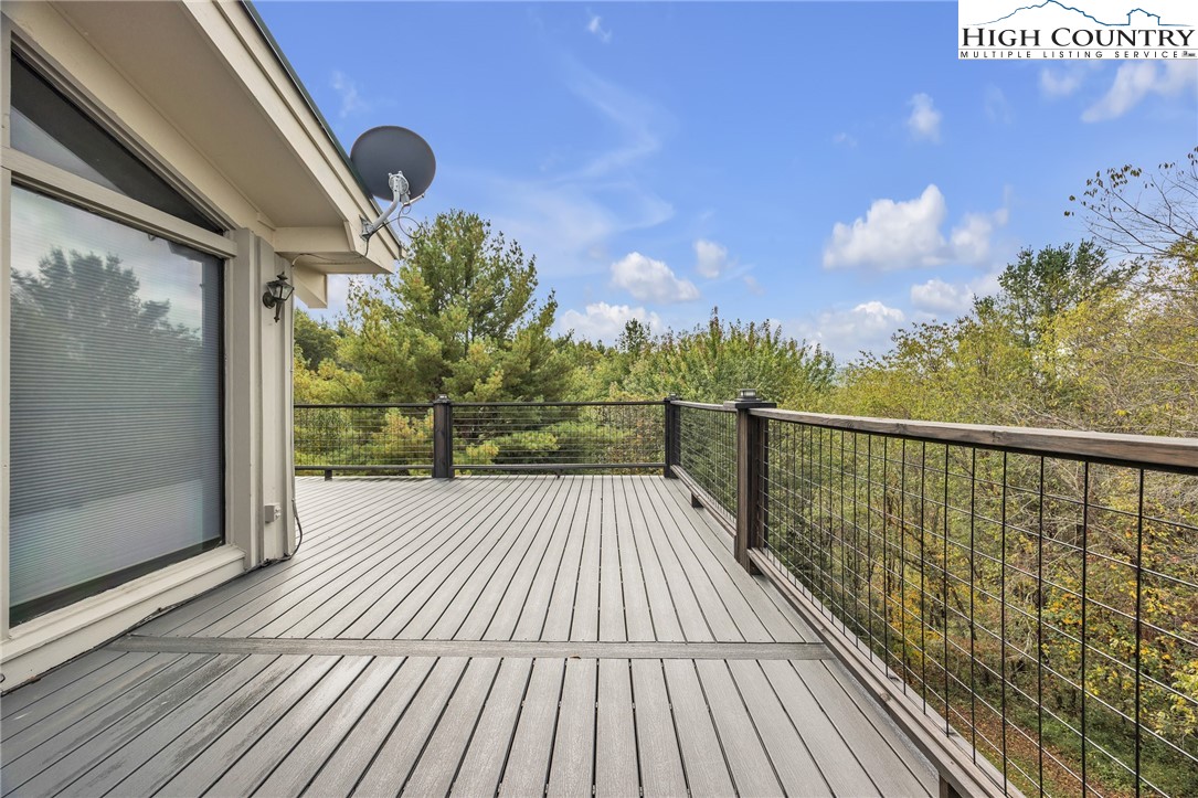 255 Clear View Ridge Crumpler, NC 28617 - Photo 34 of 42 a view of balcony with wooden floor