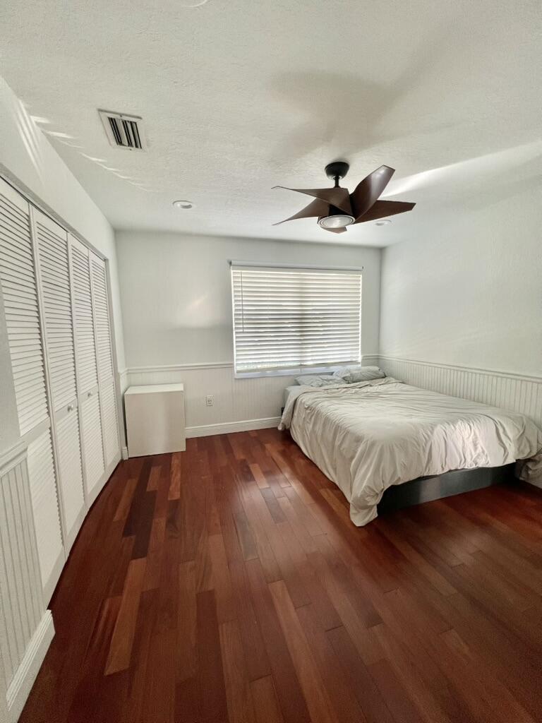 19125 Skyridge Circle Boca Raton, FL 33498 - Photo 17 of 28 a bedroom with a bed and a window