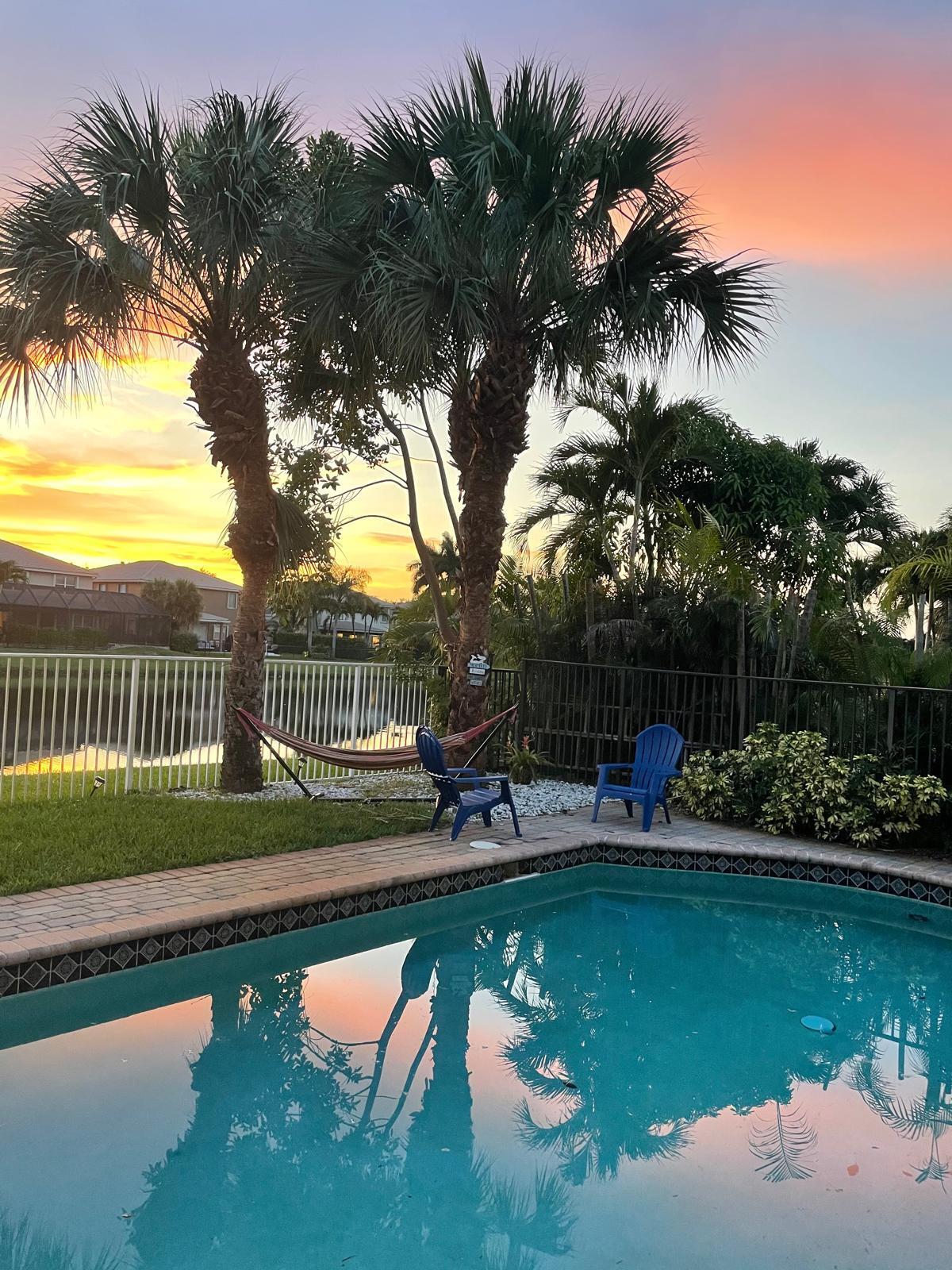 19125 Skyridge Circle Boca Raton, FL 33498 - Photo 22 of 28 a view of a lake with a house