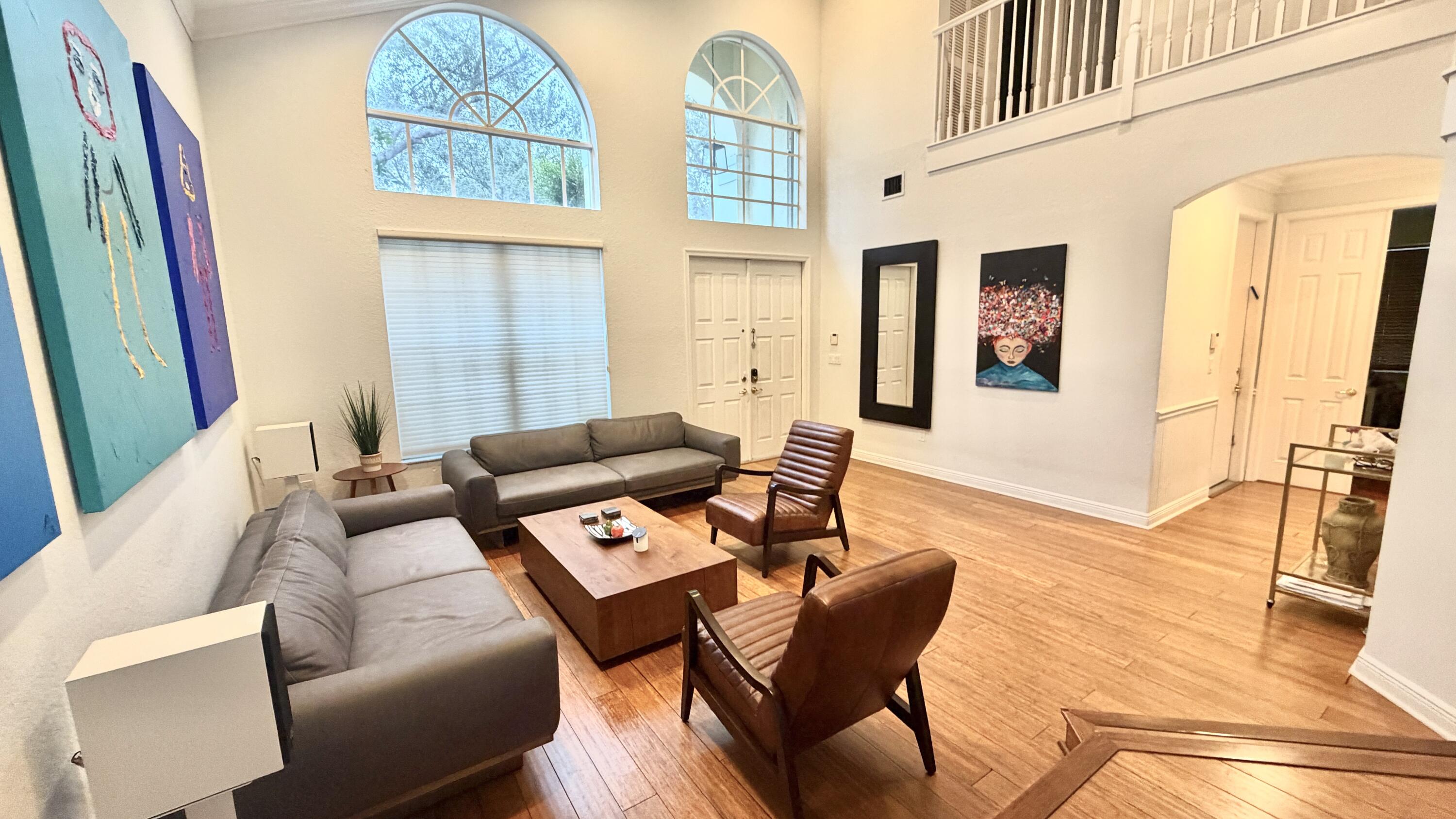 19125 Skyridge Circle Boca Raton, FL 33498 - Photo 3 of 28 a living room with furniture and a flat screen tv