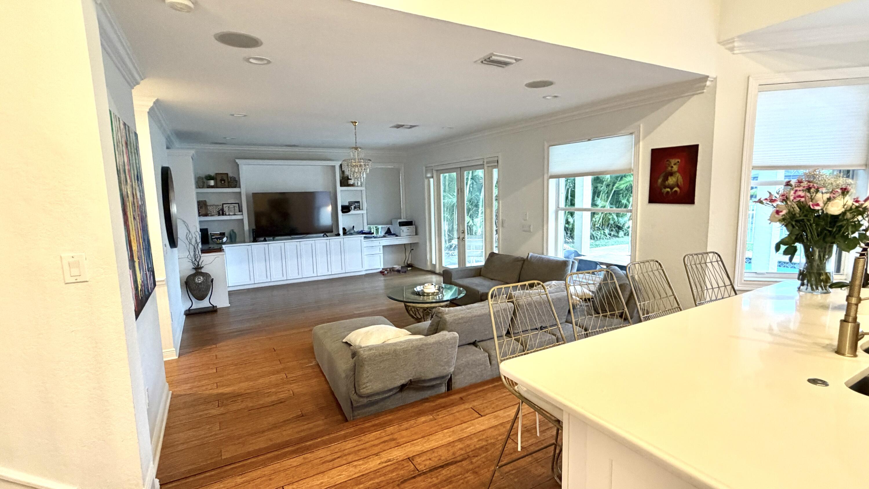 19125 Skyridge Circle Boca Raton, FL 33498 - Photo 8 of 28 a living room with furniture and a flat screen tv