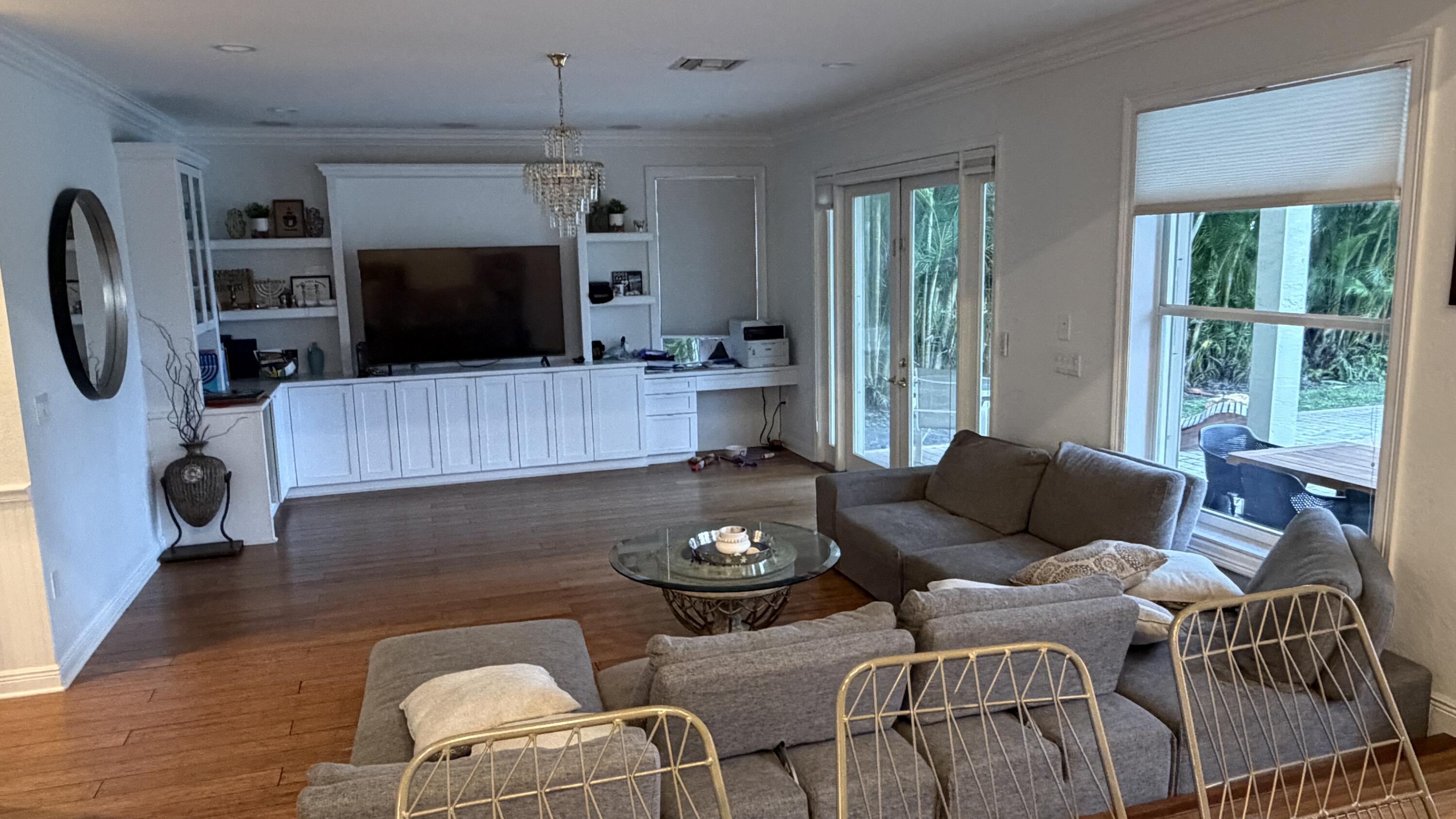 19125 Skyridge Circle Boca Raton, FL 33498 - Photo 9 of 28 a living room with furniture a flat screen tv and a window