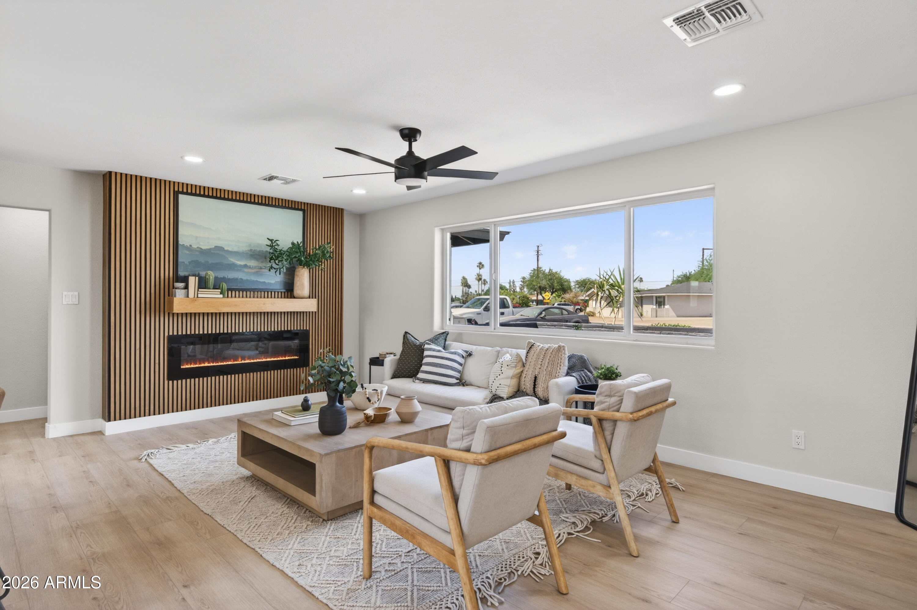 3422 South Terrace Road Tempe, AZ 85282 - Photo 10 of 43 a living room with furniture and a large window