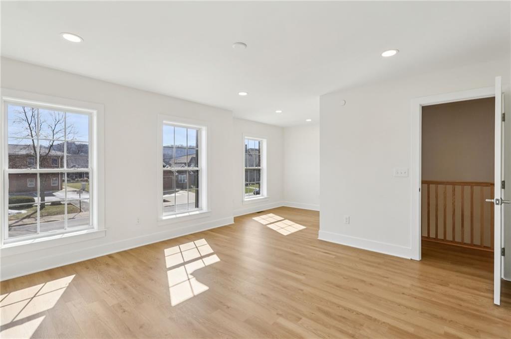 804 2nd Street Beaver, PA 15009 - Photo 12 of 29 a view of an empty room with wooden floor and a window