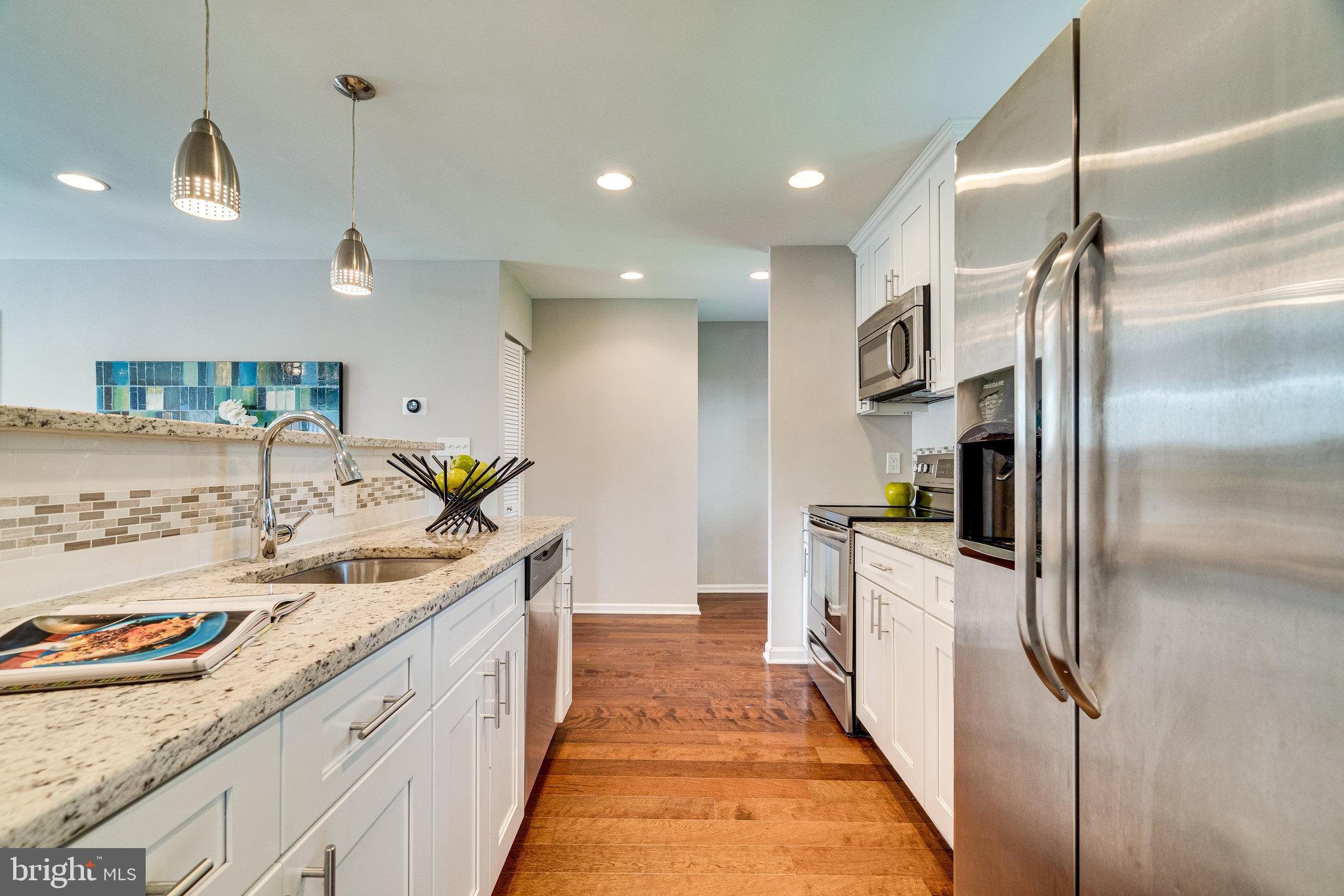 6919 Barrett Road Falls Church, VA 22042 - Photo 15 of 69 Renovated Kitchen with Stainless Steel Appliances