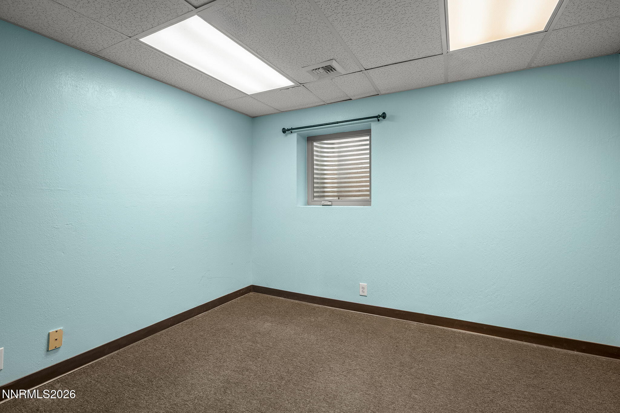 2985 Socrates Drive Reno, NV 89512 - Photo 31 of 52 an empty room with a window