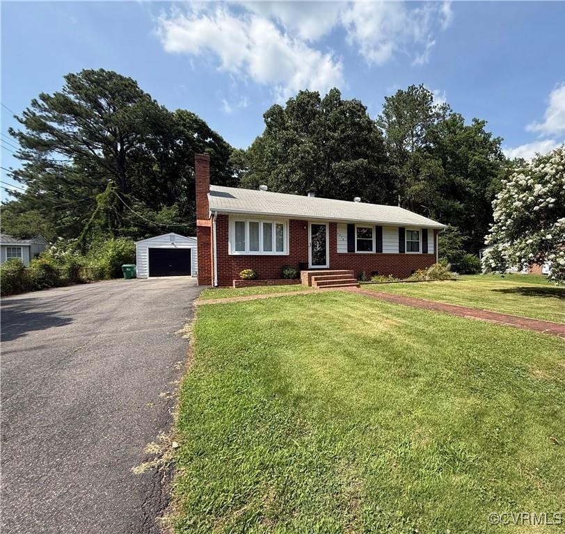 2412 Omega Road Henrico, VA 23228 - Photo 1 of 1 Ranch-style house featuring asphalt driveway, a ga