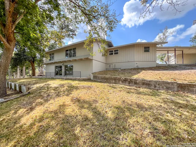 a house view with a outdoor space