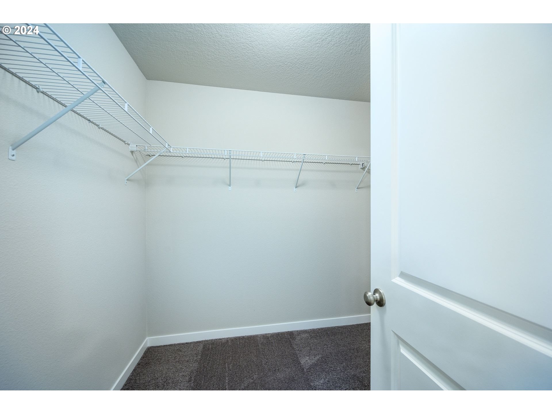 123 North 88th Drive, Unit 53 Ridgefield, WA 98642 - Photo 41 of 46 a view of an empty walk in closet