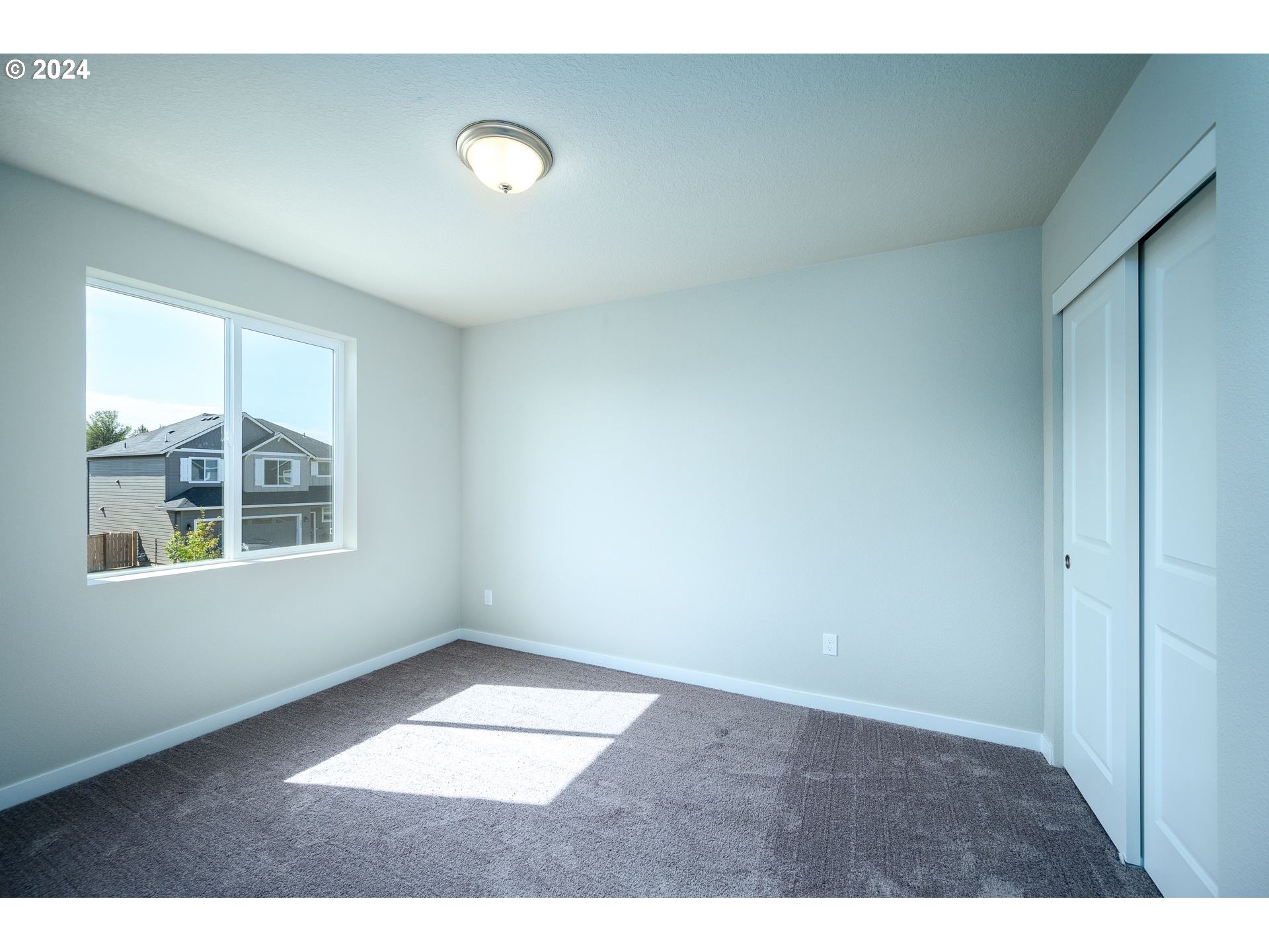 123 North 88th Drive, Unit 53 Ridgefield, WA 98642 - Photo 46 of 46 a view of an empty room with a window