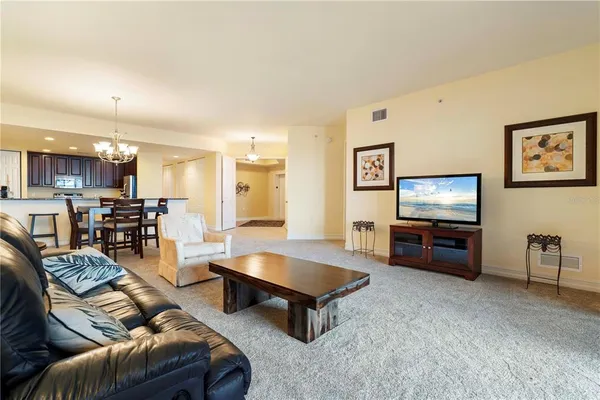 a kitchen with a sink cabinets and appliances