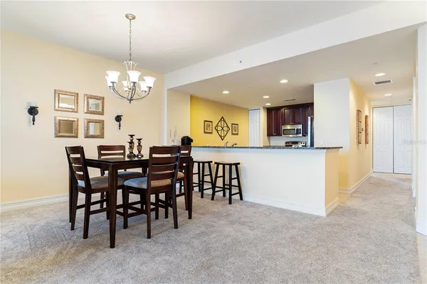 a bedroom with a bed and a lamp