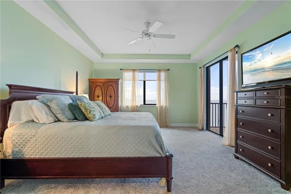 a view of a patio with couches and potted plants