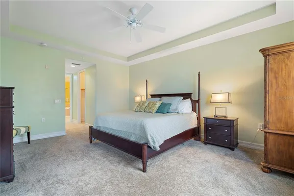 a view of a swimming pool with a table and chairs