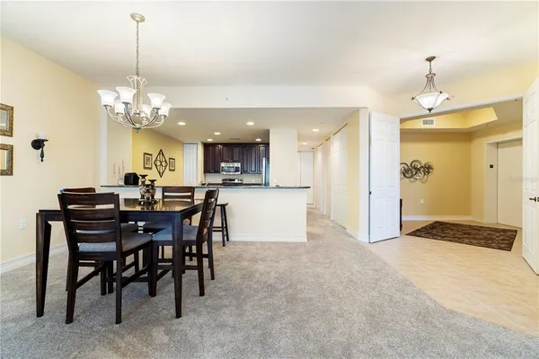a view of a livingroom with furniture and a window
