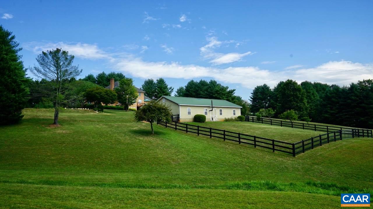 2072 Seville Road Madison, VA 22727 - Photo 2 of 37 a view of a house with a big yard and a large tree