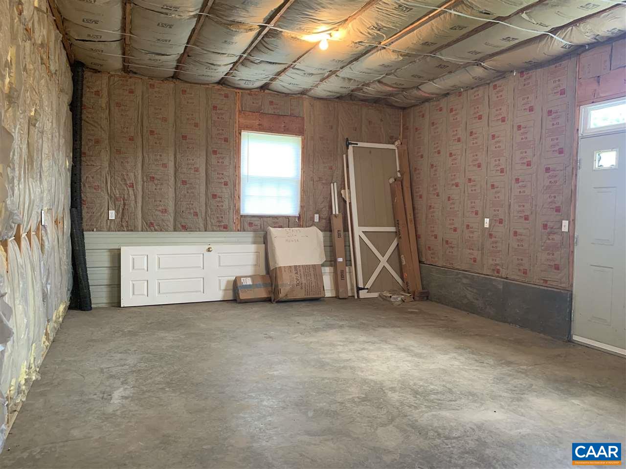 2072 Seville Road Madison, VA 22727 - Photo 35 of 37 a view of an empty room with a fireplace