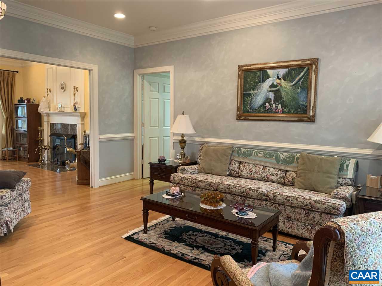 2072 Seville Road Madison, VA 22727 - Photo 8 of 37 a living room with furniture and a floor to ceiling window
