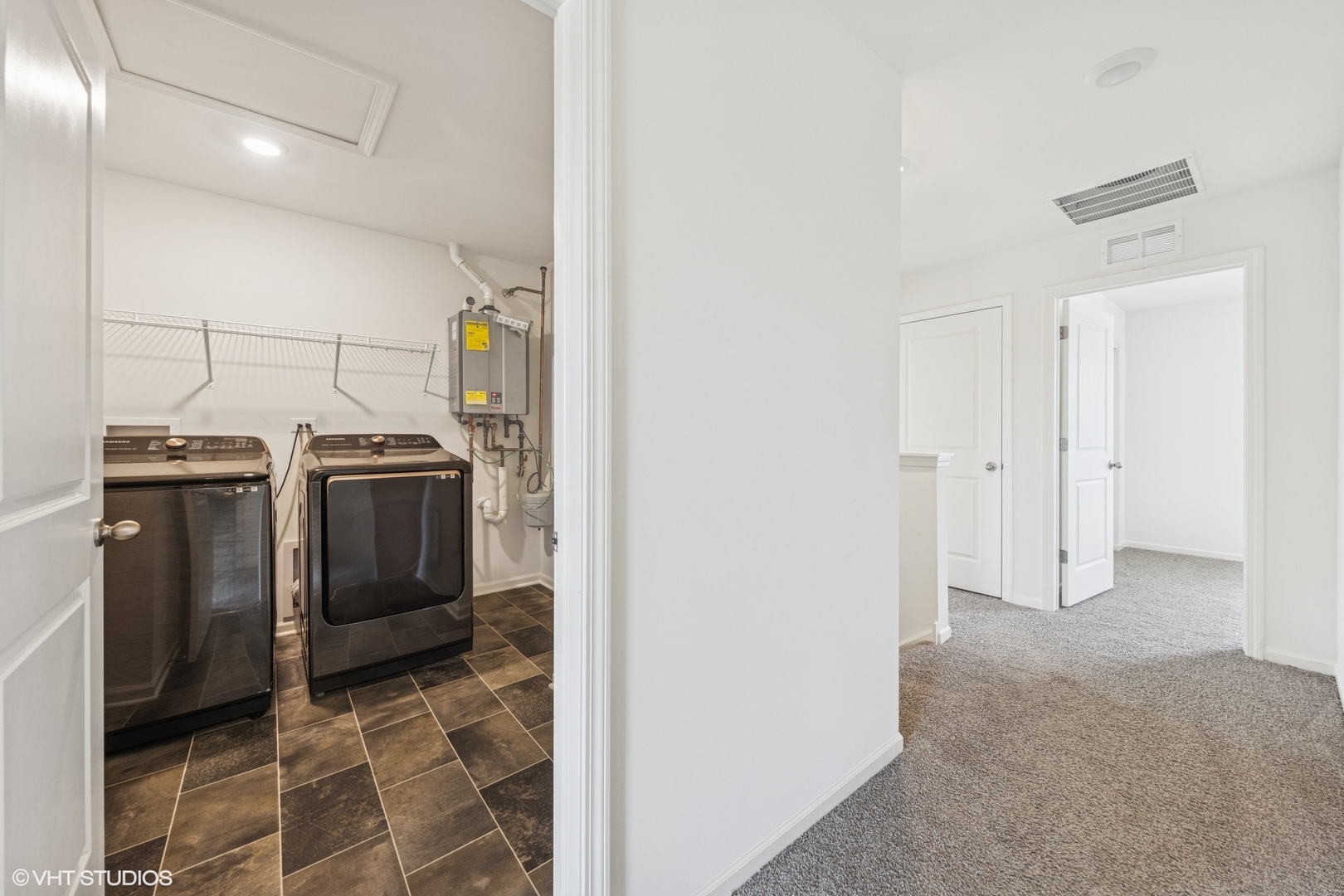 411 Stockton Drive Joliet, IL 60421 - Photo 21 of 29 a view of a storage & utility room with washer and dryer