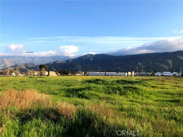 a view of a lake with sunset