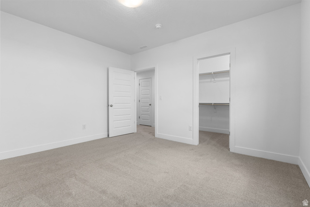 43 South Crimson Way, Unit 311 Mapleton, UT 84664 - Photo 24 of 28 Neutral carpet flooring and white walls