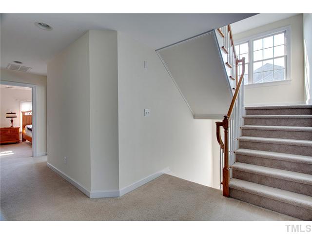4617 Mentone Way Raleigh, NC 27612 - Photo 22 of 23 a view of entryway and hall with wooden floor