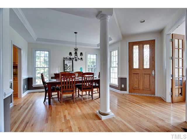 4617 Mentone Way Raleigh, NC 27612 - Photo 4 of 23 a dining room with furniture window and wooden floor