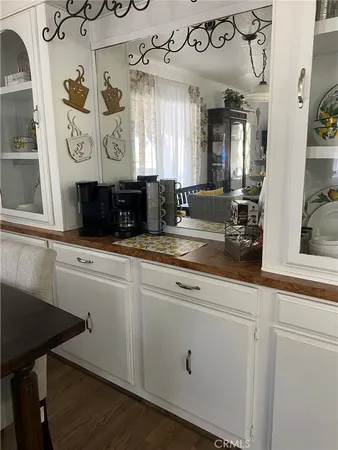 a kitchen with a sink and a refrigerator