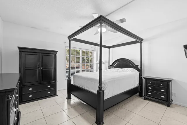 a bedroom with a bed and a closet