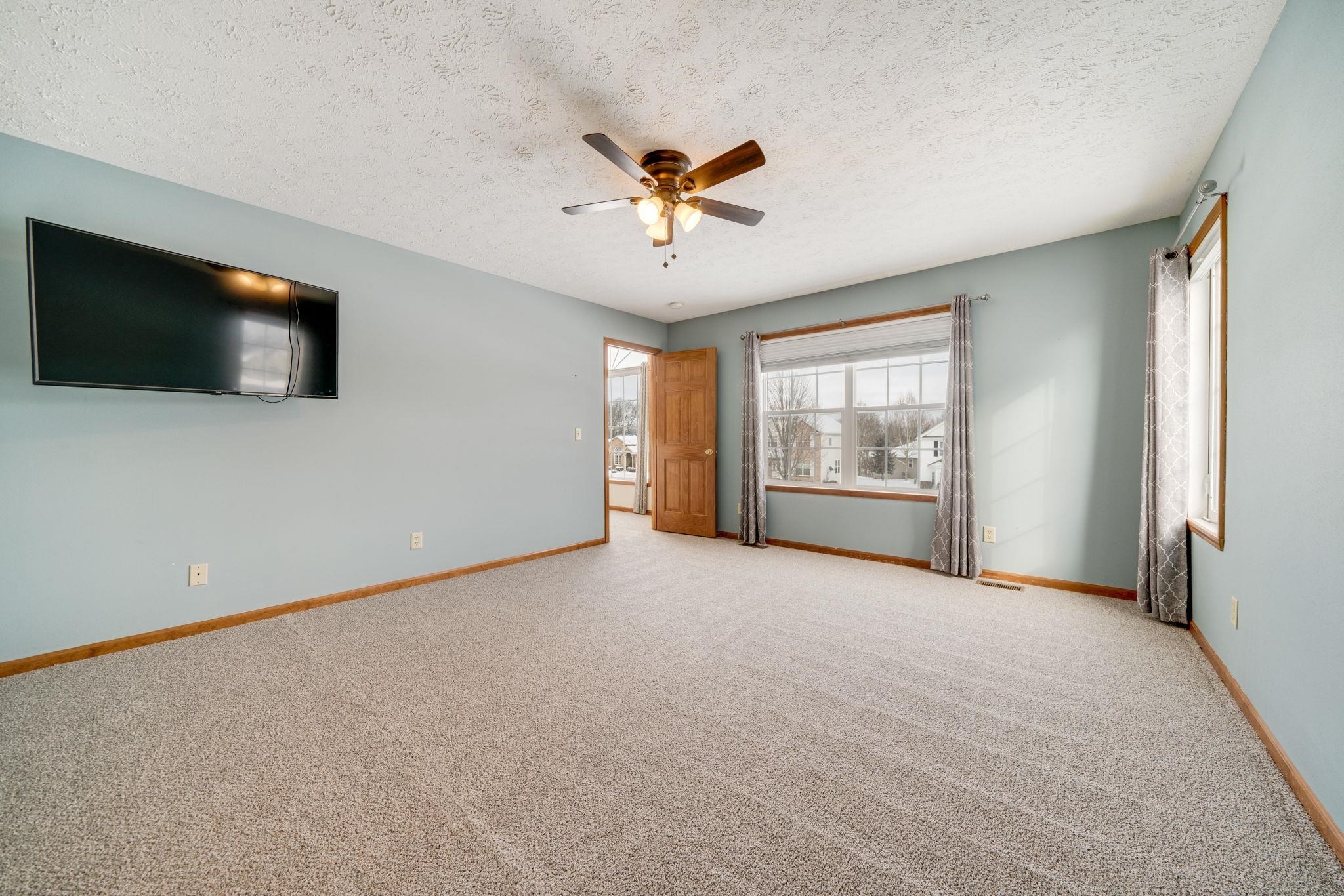 11062 Chicory Ridge Way Roscoe, IL 61073 - Photo 11 of 43 a view of an empty room with a window